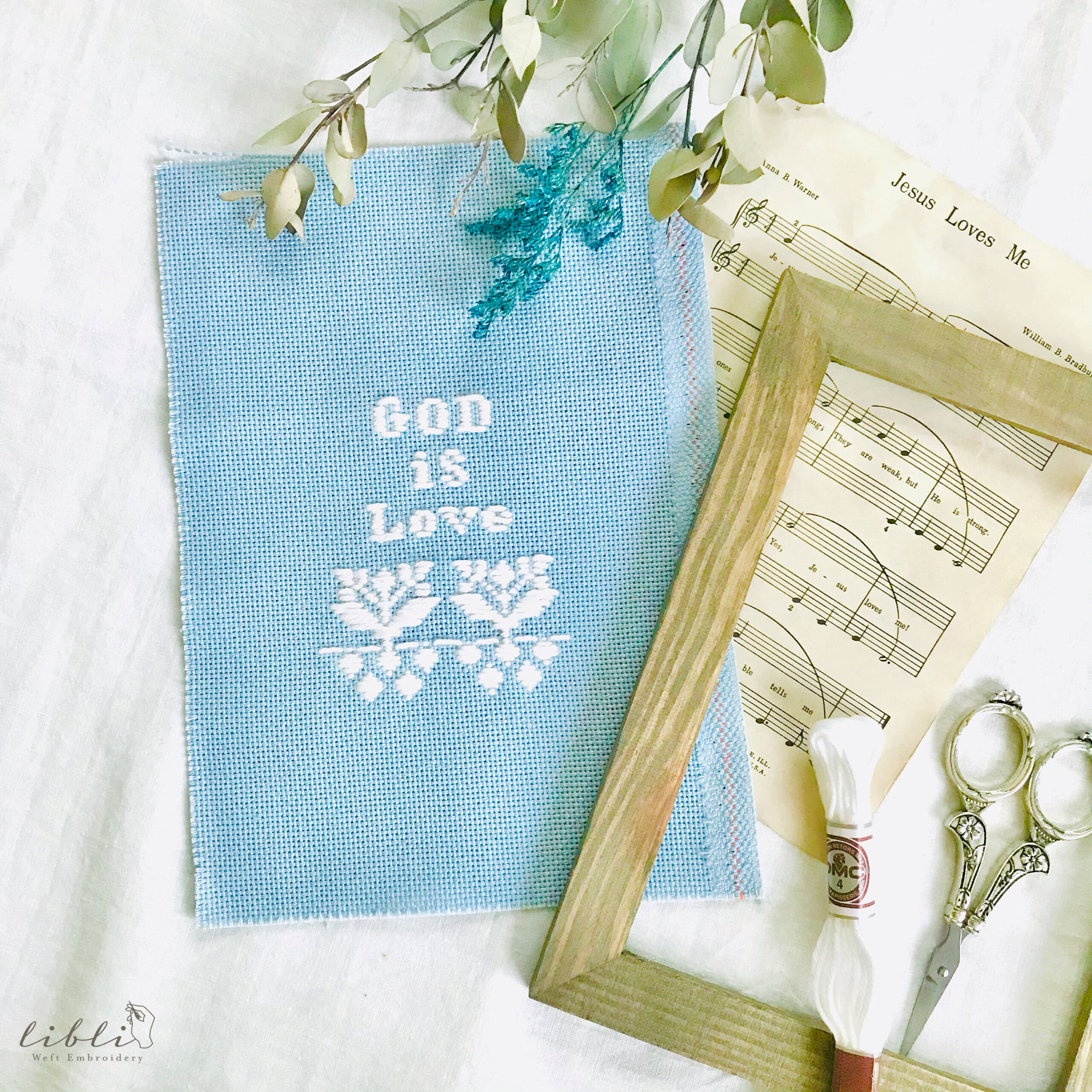 『GOD is Love』の横糸刺繍模様